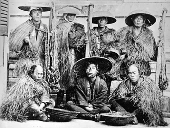 Coolies japonais en manteaux de paille, vers 1860